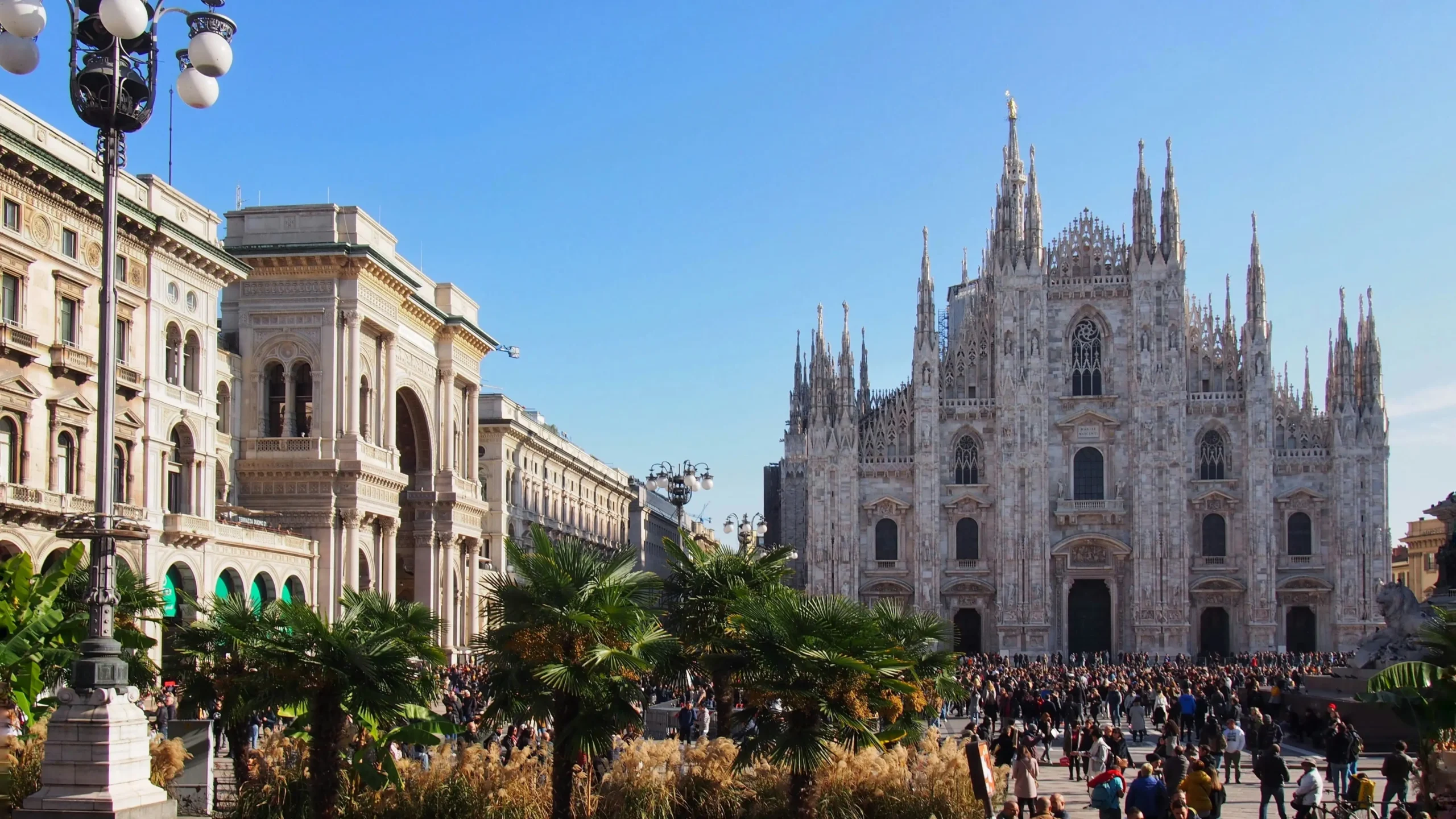 View of Piazza Duomo in Milan. In this picture, you can see the Milan Cathedral and the Galleria Vittorio Emanuele II.