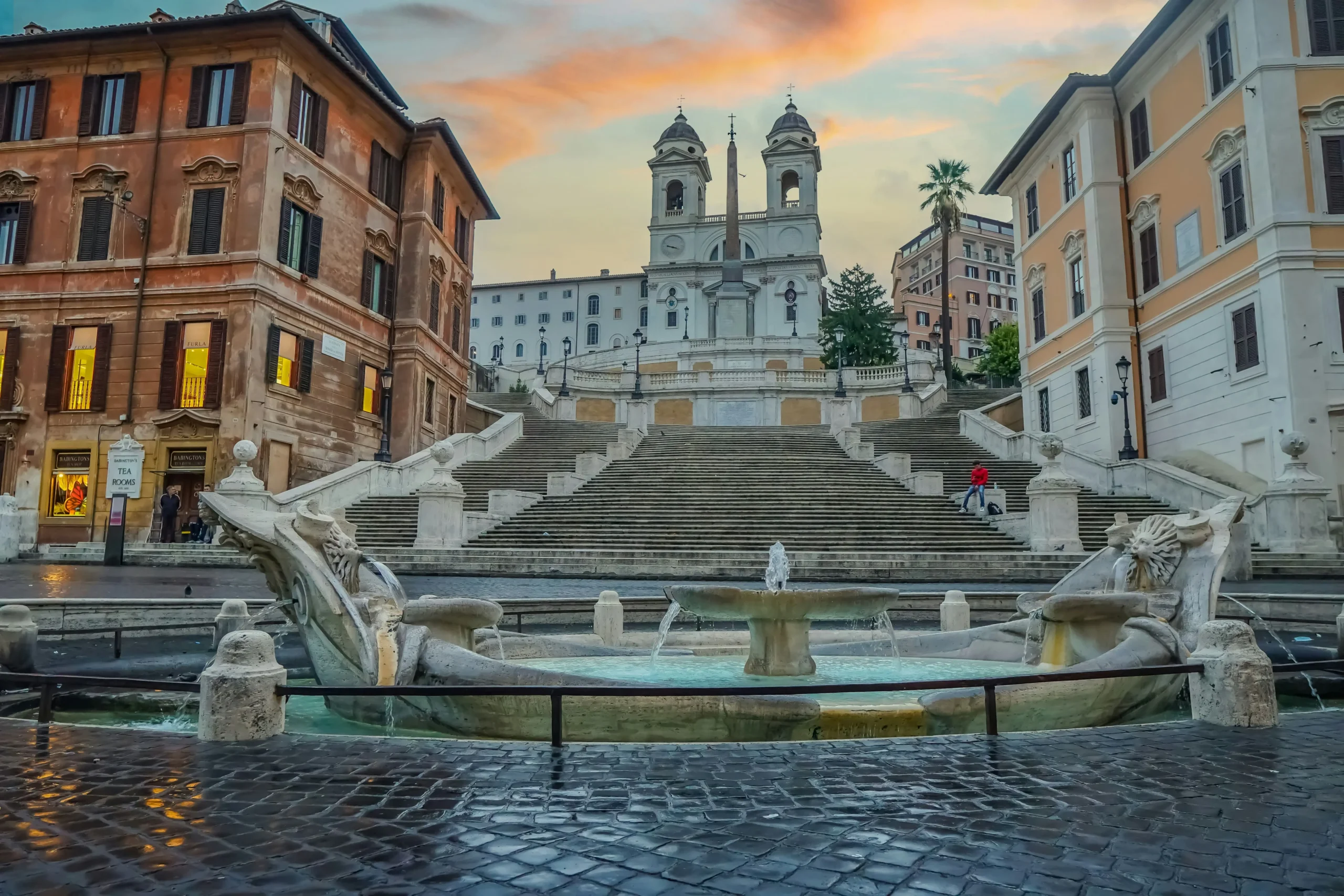 Front view of the Spanish Steps at Piazza di Spagna, Rome, showing the full staircase and surrounding architecture.